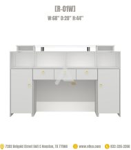 Behind the reception desk